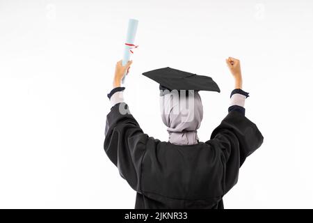 Rückansicht des Fotos einer Hochschulabsolventin in Toga Stockfoto