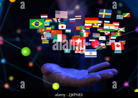 Eine Darstellung von Länderflaggen im Jahr 3D über hands-global communication concept Stockfoto