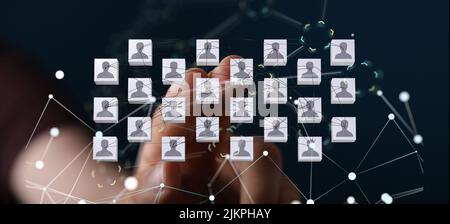 Eine Darstellung von menschlichen Symbolen aus dem Jahr 3D mit handlichem Tippen auf diese Symbole aus dem Kommunikationskonzept hinter sozialen Netzwerken Stockfoto