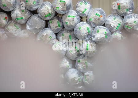 Arbeiter in der Textilindustrie Kontrollprodukte für Wearhouse Stockfoto