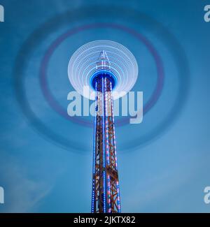 Leichte Spuren von der Fahrt mit dem Flugstuhl auf der St Giles Fair, Oxford. September 2014 Stockfoto