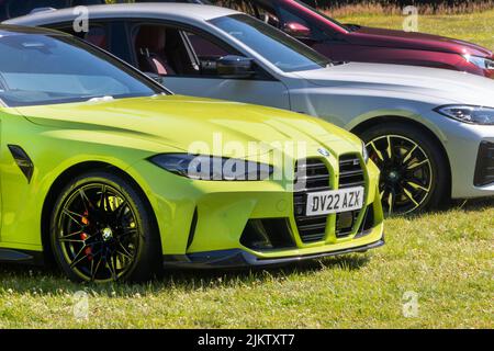 Vorderseite von Limettengrün 2022 BMW M4 Wettbewerb DV22AZX Stockfoto