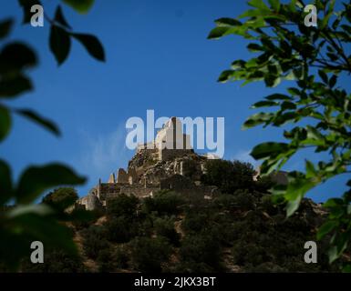 Blick auf die Rocca di San Leo. Eine mittelalterliche Stadt in der Vergangenheit wurde von Bergleuten bewohnt. Seit Jahrhunderten verlassen. Campiglia Marittima. Livorno. Toskana Stockfoto