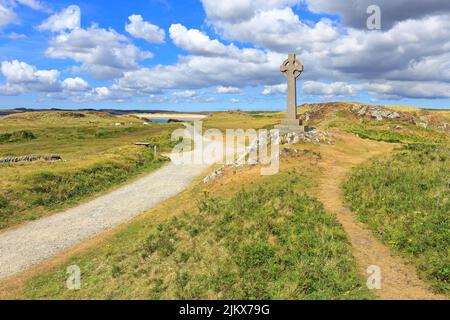 Keltisches Kreuz auf Llanddwyn Island, Ynys LLanddwyn, Isle of Anglesey, Ynys Mon, North Wales, VEREINIGTES KÖNIGREICH. Stockfoto