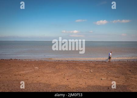 Wurfpflücker am Dunster Dunster Beach Stockfoto