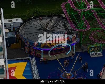 Farbenfroher Jahrmarkt in Towyn North Wales aus der Luft, Aerial Drone, Birds Eye View, Inc. Der BERÜHMTE Albert Evans Atmosphere Creator Waltzers Stockfoto