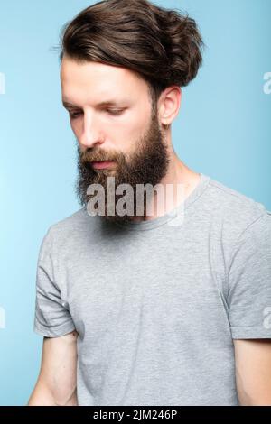 Traurig depressiv frustriert mürrisch dumpfer Hipster Mann Stockfoto