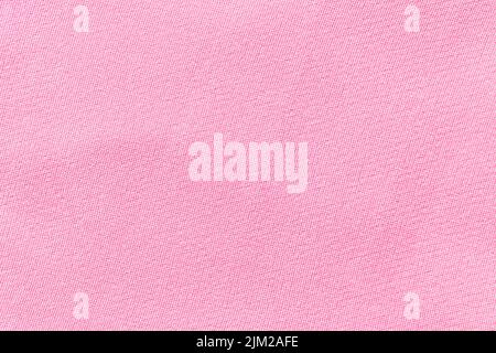 Kleidung Rosa Farbe Stoff Textur Hintergrund, Draufsicht auf Stoff textile Oberfläche Stockfoto