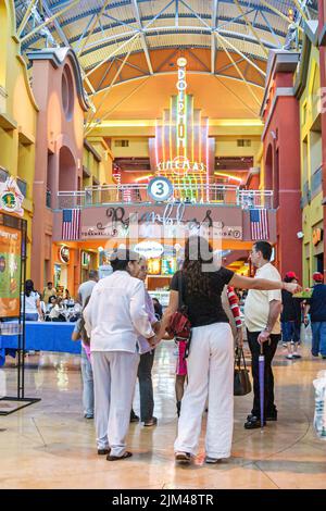 Miami Florida, Dolphin Mall Kino Neonschild, innen Käufer Einkaufen Besucher, Gruppe Menschen Person Szene auf einem Foto, USA Stockfoto