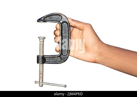 Isolierter Außenhandgriff, der einen Schraubenschlüssel hält Stockfoto