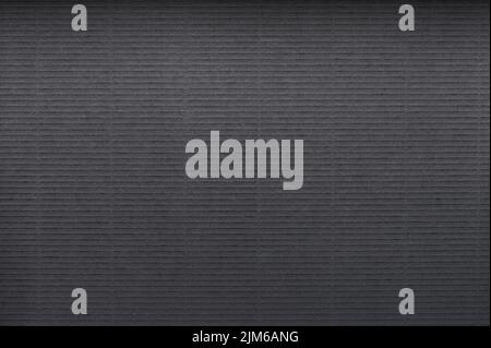 Makro-Nahaufnahme der strukturierten schwarzen Papieroberfläche Stockfoto