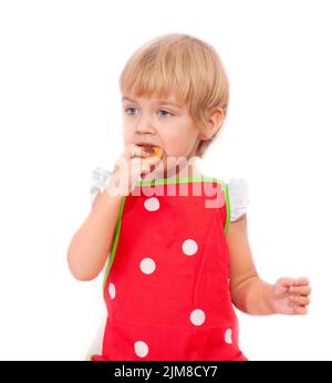 Kleine Mädchen essen bagel Stockfoto