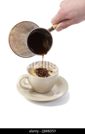 Kaffee aus der Kaffeemaschine in der Tasse Stockfoto