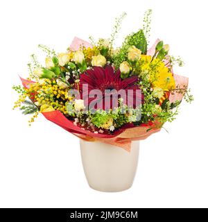 Schönes Bouquet von Gerbera, Nelken und anderen Blumen in Vase. Stockfoto