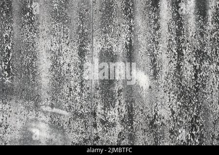 Grau polierter Beton Grunge strukturierte Wand, raue Wand Textur Hintergrund, beschädigte schmutzige moosige Wandoberfläche. Stockfoto