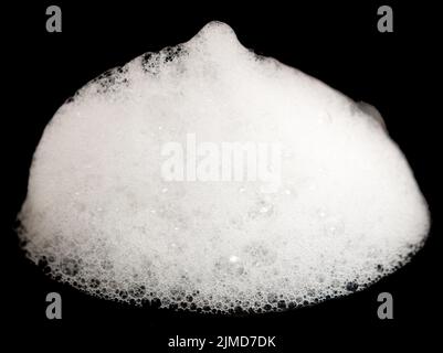 Schaum auf Schwarz Stockfoto