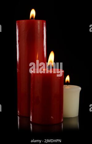 Drei Kerzen Leuchten Stockfoto