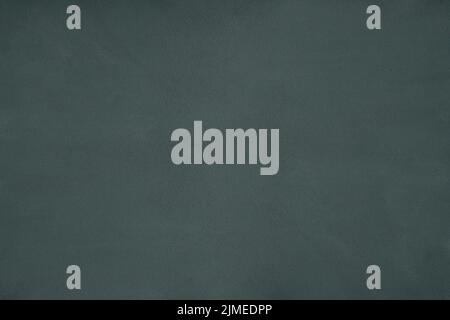 Die Textur des olivfarbenen Samtstoffes - Draufsicht und Nahaufnahme eines Fragments aus grünem Samt Stockfoto