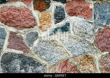 Steinwand ein Hintergrund oder Textur Stockfoto