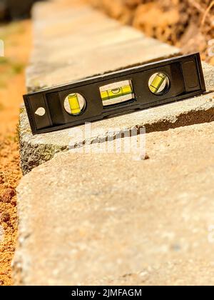 Bau einer neuen Stützwandbasis Stockfoto