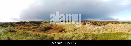 Dünen und Leuchtturm am Strand von Amrum, Deutschland, Europa Stockfoto