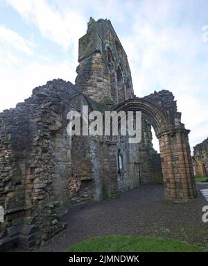 Die Ruinen der Kilwinning Abbey in Kilwinning, Schottland. Sie wurde 1100 erbaut und 1560 während der Reformation zerstört. Stockfoto