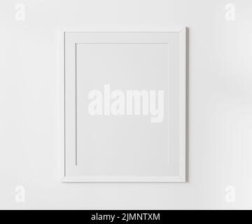 Weißer leerer Rahmen mit Matte auf weißem Wandmodell, 4:5 Verhältnis - 40x50 cm, 16 x 20 Zoll, Posterrahmen-Modell, 3D Rendering Stockfoto