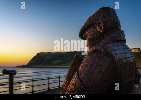 Freddie Gilroy und die Belsen Stragglers Statue des Bildhauers Ray Lonsdale, gelegen an der North Bay Promenade in Scarborough, England. Stockfoto