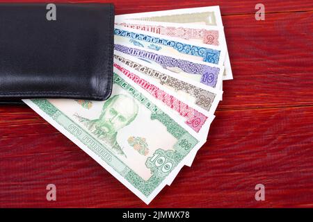 Alte ukrainische Geld in der schwarzen Mappe Stockfoto