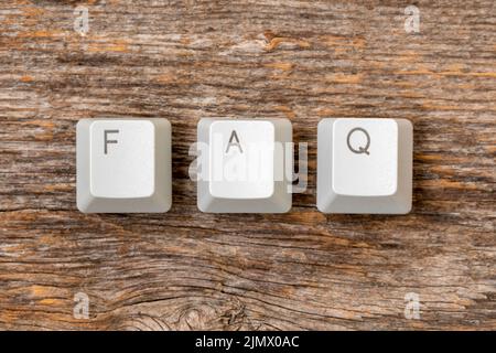 Vier Computertastaturtasten angeordnet, um FAQ-Wort zu buchstabieren Stockfoto