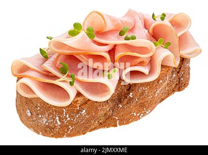 Schinkenscheiben auf Roggenbrot isoliert auf weißem Hintergrund Stockfoto