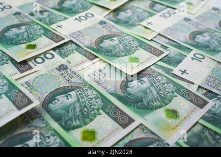 Hintergrund aus dem Geld. Polnische Banknoten. 100 Zloty Stockfoto