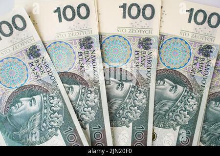 Hintergrund aus dem Geld. Polnische Banknoten. 100 Zloty Stockfoto
