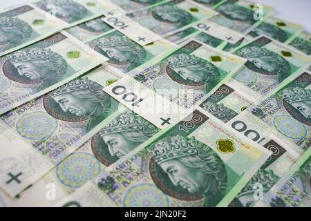 Hintergrund aus dem Geld. Polnische Banknoten. 100 Zloty Stockfoto