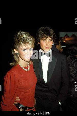 DATEIBILDER: Olivia Newton-John 1948-2022. **DATEI FOTO** Olivia Newton-John ist verstorben. Olivia Newton-John und Matt Lattanzi 1983 Credit: Ralph Dominguez/MediaPunch Credit: MediaPunch Inc/Alamy Live News Stockfoto