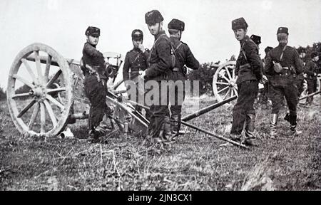 Gewehre und Besatzung der belgischen Pferdeartillerie während der frühen Phasen des Ersten Weltkriegs (1914-1918). Stockfoto