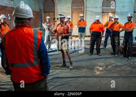 Arbeitsschutztreffen auf einer Baustelle in Hobart, Tasmanien Stockfoto