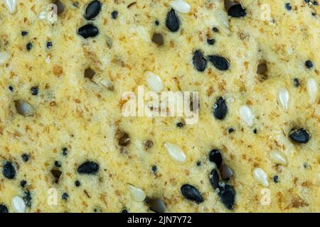 Nahaufnahme eines Multi-Grain-Crackers mit Sesam, Flachs, Roggen und Mohn. Stockfoto