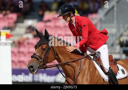 Herning, Dänemark. 10. August 2022. Pferdesport: Weltmeisterschaft, Springreiten. Springreiter Jana Wargers (Deutschland) reitet Limbridge. Quelle: Friso Gentsch/dpa/Alamy Live News Stockfoto