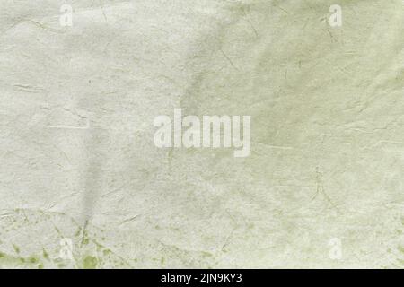 Textur von Handwerk hellgrün alten Papier, zerknittert Hintergrund. Vintage Olive Grunge Oberfläche Hintergrund. Struktur aus Pergamentkarton. Stockfoto
