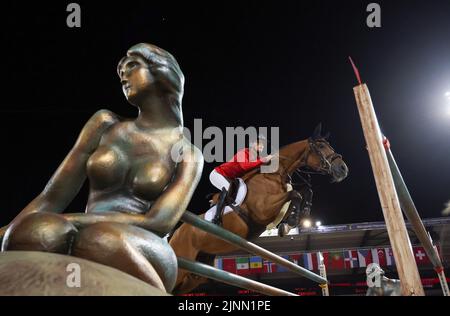 Herning, Dänemark. 12. August 2022. Pferdesport: Weltmeisterschaft, Springreiten. Springreiter Jana Wargers (Deutschland) reitet Limbridge. Quelle: Friso Gentsch/dpa/Alamy Live News Stockfoto