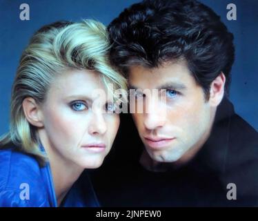 JOHN TRAVOLTA und OLIVIA NEWTON-JOHN in TWO OF A KIND (1983), Regie: JOHN HERZFELD. Kredit: 20. CENTURY FOX / Album Stockfoto