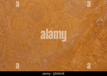 Travertin Gelb Hintergrund, Textur in warmen Farben für persönliche Sammlung. Stockfoto