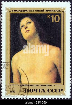 UdSSR - UM 1982: Eine in der UdSSR gedruckte Briefmarke aus der Ausgabe 'Italienische Gemälde im Hermitage Museum' zeigt den Heiligen Sebastian (Pietro Perugino). Stockfoto