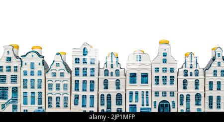 Reihe von blauen Miniatur-Souvenir-Porzellan Amsterdam Grachtenhäusern Stockfoto