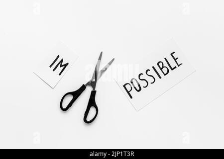 Wort unmöglich wird möglich. Motivationskonzept Stockfoto