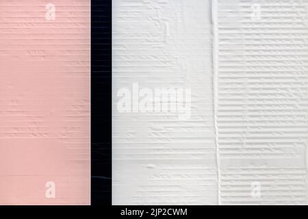 Werbeposterpapier als Kopierfläche und Hintergrund - rosa schwarz-weiße Farbe Stockfoto