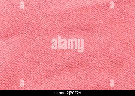 Kleidung Rosa Farbe Stoff Textur Hintergrund, Draufsicht auf Stoff textile Oberfläche Stockfoto