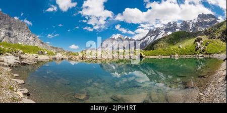 Das Panorama des Oberhornsee mit der Jungfrau, dem Mittaghorn und dem Grosshorn. Stockfoto