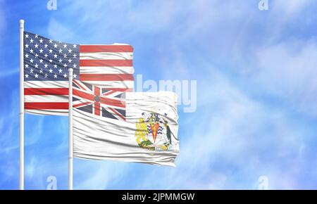 Schwenkende amerikanische Flagge und Flagge des Britischen Antarktischen Territoriums. Stockfoto